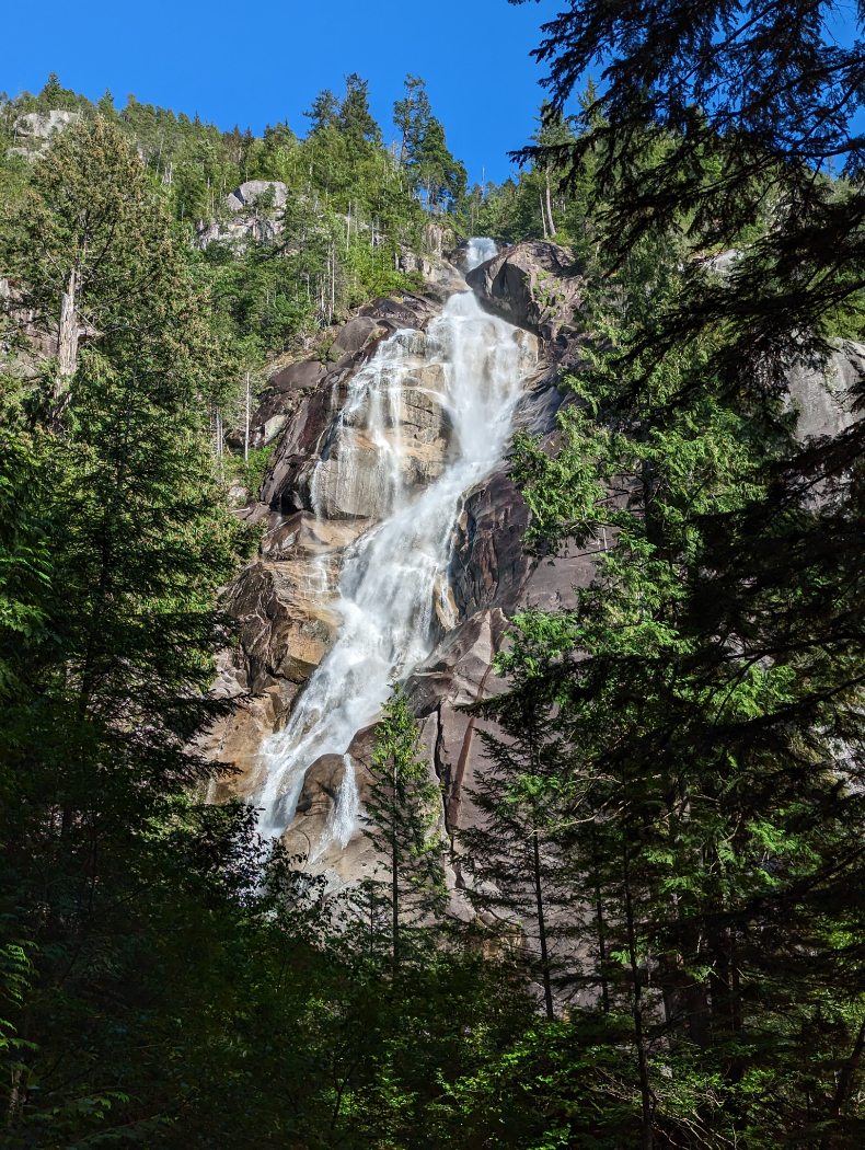 Shannon Falls waterfall amid the forest, in Squamish
